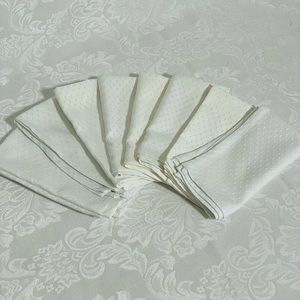Used White Napkins. Poly blend. No stains or snags. Lot of 8.